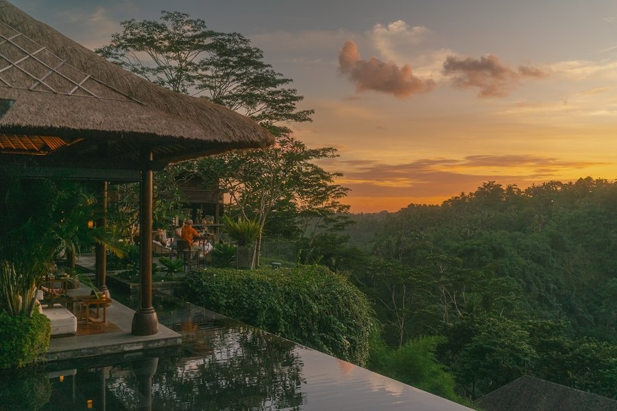 Ambar at Mandapa Ubud. Above the jungle. Above the river. Sanskrit for sky. At golden hour it earns the name.