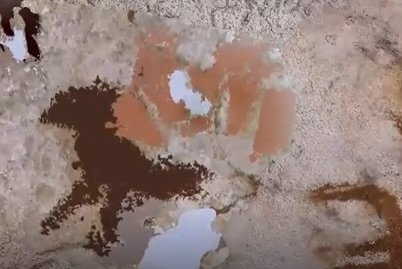 67800 year old hand stencil Liang Metanduno Muna Island Sulawesi Indonesia oldest cave art world record non-figurative